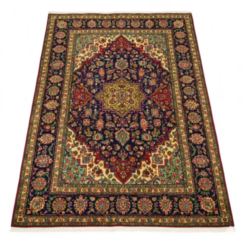 Handgeknüpfter Orientteppich mit Fransen, Medaillon in der Mitte und Blumenmuster in Dunkelblau, Rot, Grün und Beige